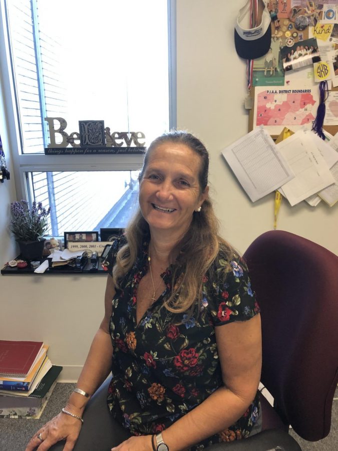 AD Janet Columbro pictured at her desk in the Fitness Center