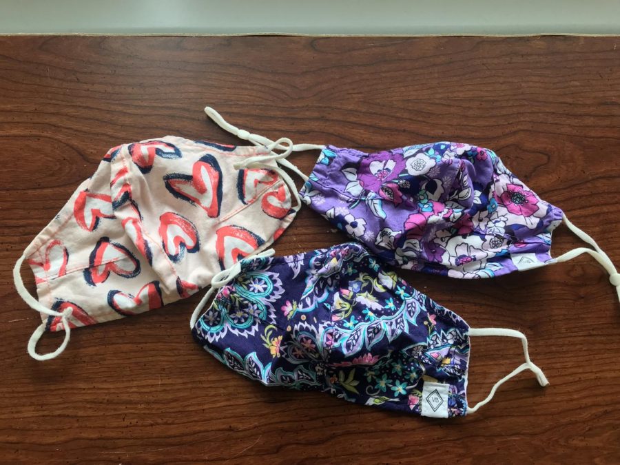 Photo of Mrs. Fabrey’s Vera Bradley face masks that she carries in her purse.