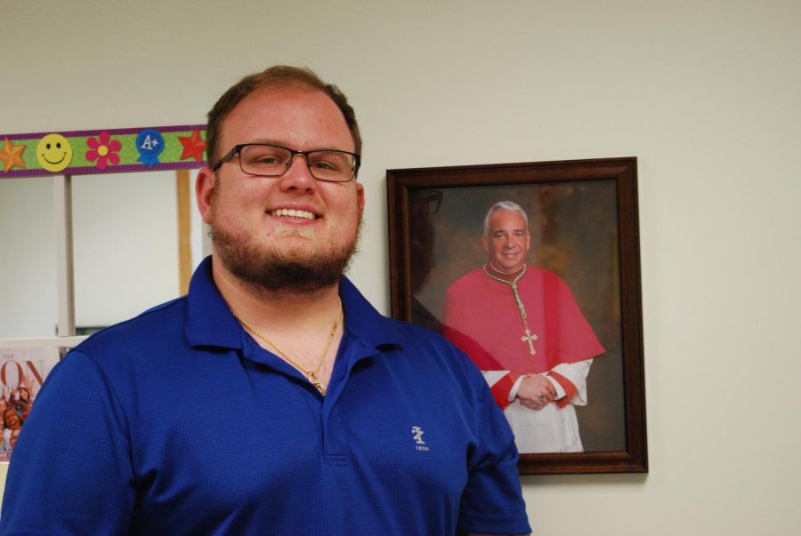 Mr. Ryan Lattanze smiles for a photo outside of his office in guidance.