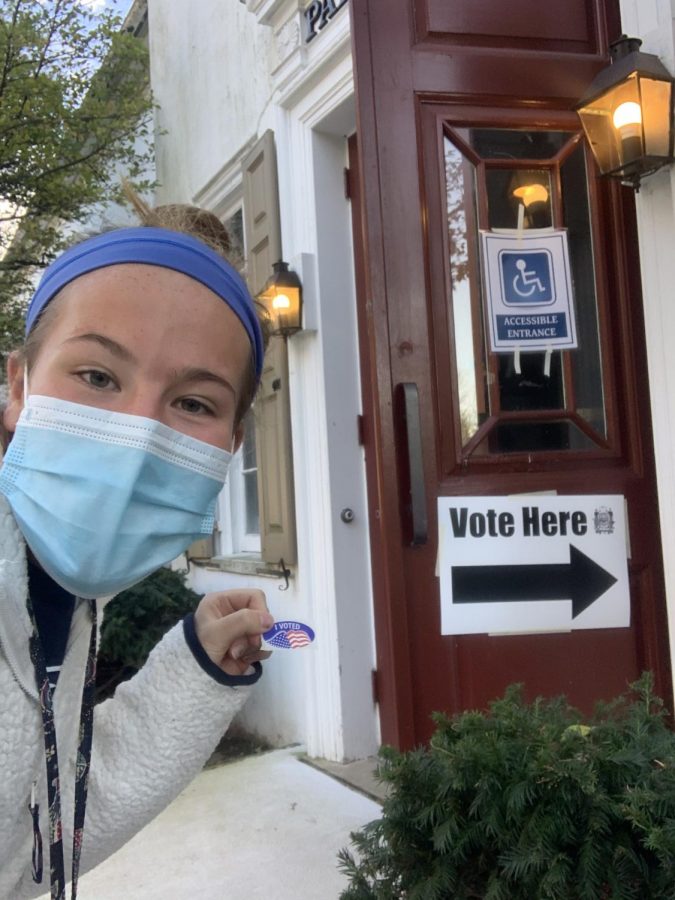 Margaret Kuffner ‘21 smiles through her mask after successfully voting for the first time.