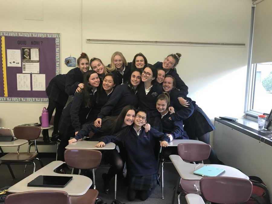 Mrs. Michelle Fabrey’s advisory began their tradition of donuts and group pictures on each Friday of their sophomore year. Through the years the advisory has grown closer and shared many fun times. 
Pictured: Top row left to right: Brianna Reis ‘21, Kate Roberts ‘21, Margaux Rawson ‘21, Alexandra Weeks ‘21, Maggie Woolley ‘21. Second Row left to right: Maura Scanlon ‘21, Hannah Rossmeisl ‘21, Dev Reinhardt ‘21, Grace Walker ‘21, Carolyn Taylor ‘21. Bottom Row left to right: Alexandra Ritter ‘21, Nicole Rausa ‘21, Eimile Scibelli ‘21

