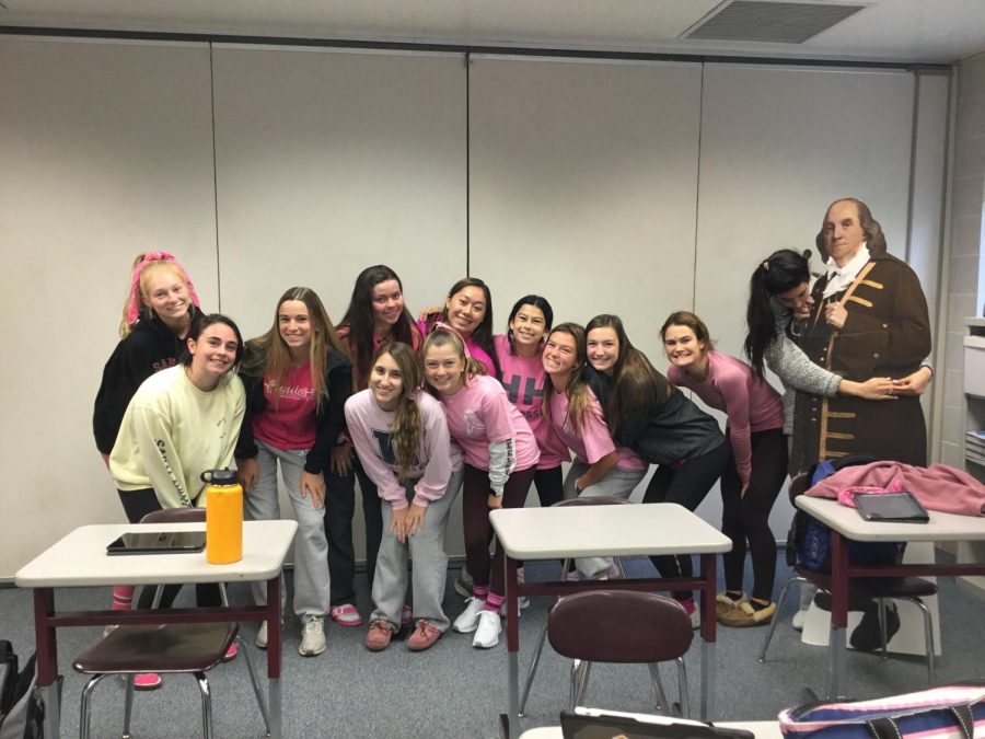 In October of their junior year the girls were rewarded with an all pink dress down day to support breast cancer. 