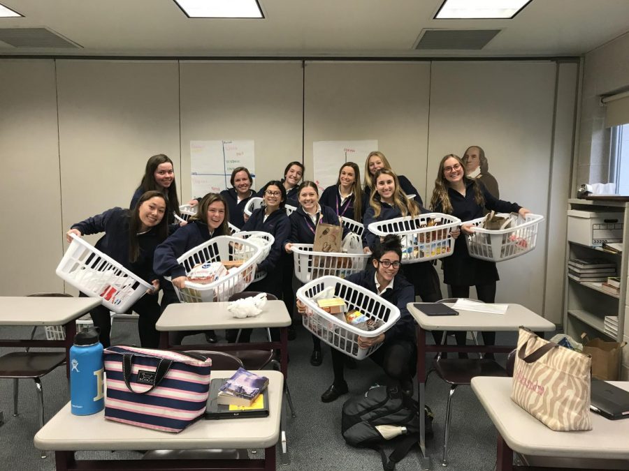 For Thanksgiving the advisory worked together to sponsor twelve family Thanksgiving baskets for Lasalle Academy.