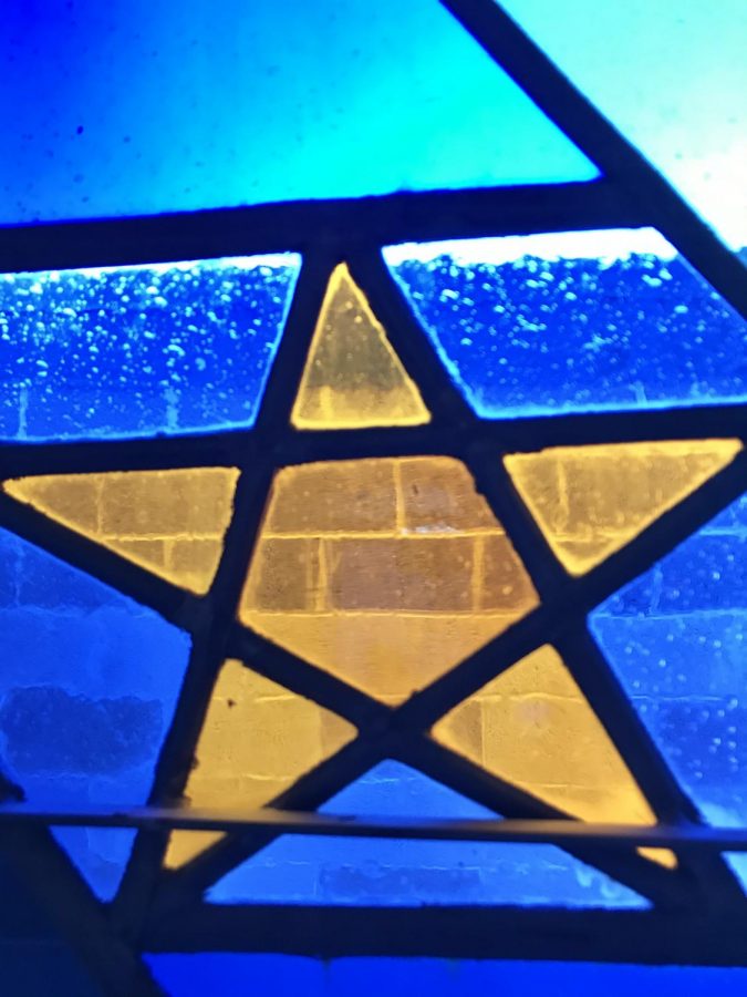 A stained glass star in Mounts chapel. Stars are one of the many symbols of the Mounts sisterhood. 