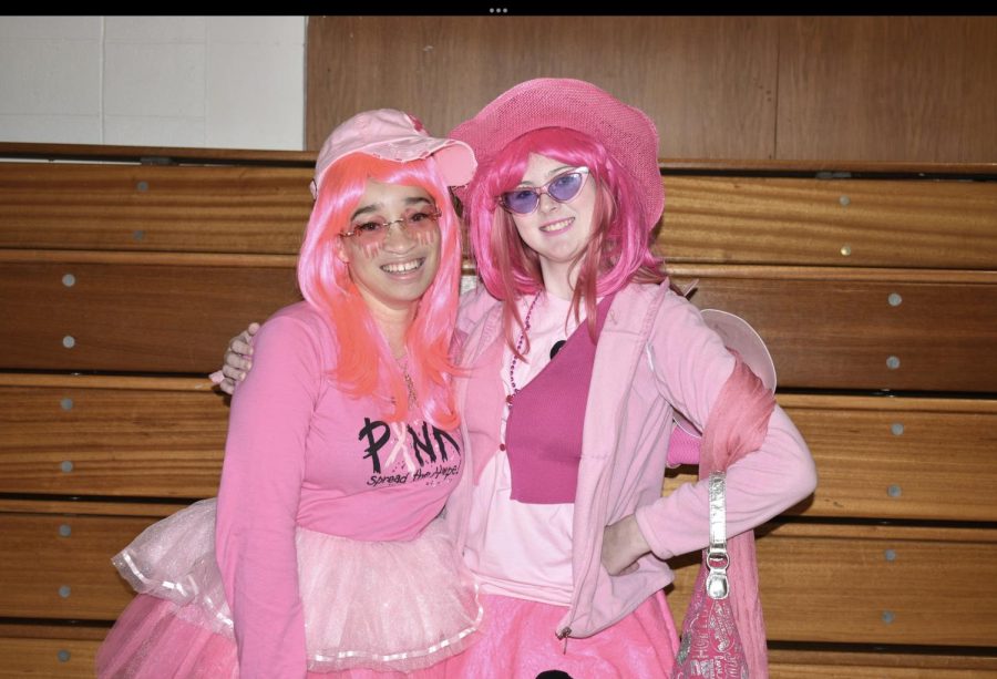 Kennedy Willis 25 and Erin McCafferty 25 pose for a photo after winning the pinkalicious contest. On the final day of Pink Week students are encouraged to wear all pink.