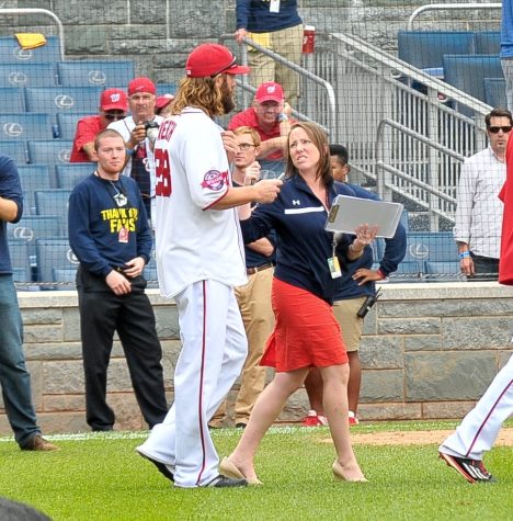 Gannon leading Nats players to a special post-Game event with donors