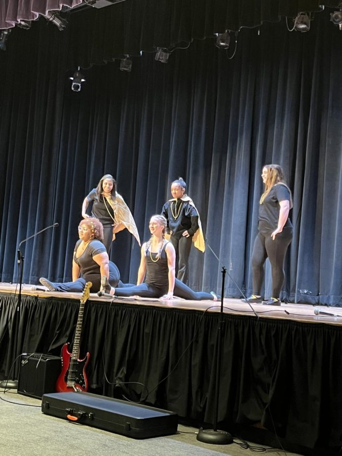 Dance Club finishes their routine with impressive splits by Saanai Jones '24 and Pauline Rawson '24.