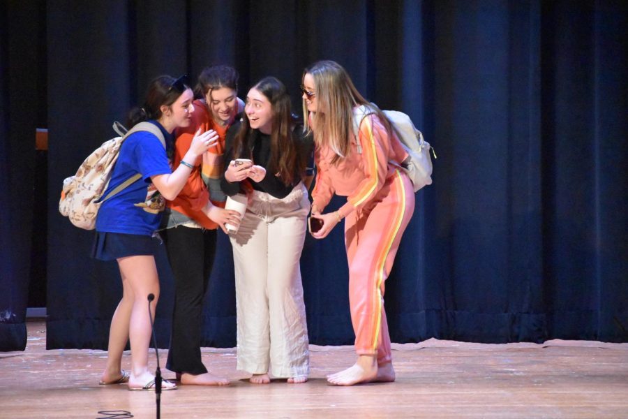 Maddi Allen ‘23, Julia Solecki ‘23, Mary Kate Andress ‘23 and Devin Loome ‘23 gush over Char At the Shore during a Charity Day 2023 skit, reflecting back on Sister Charlene’s events in New Jersey during the summer of 2022.