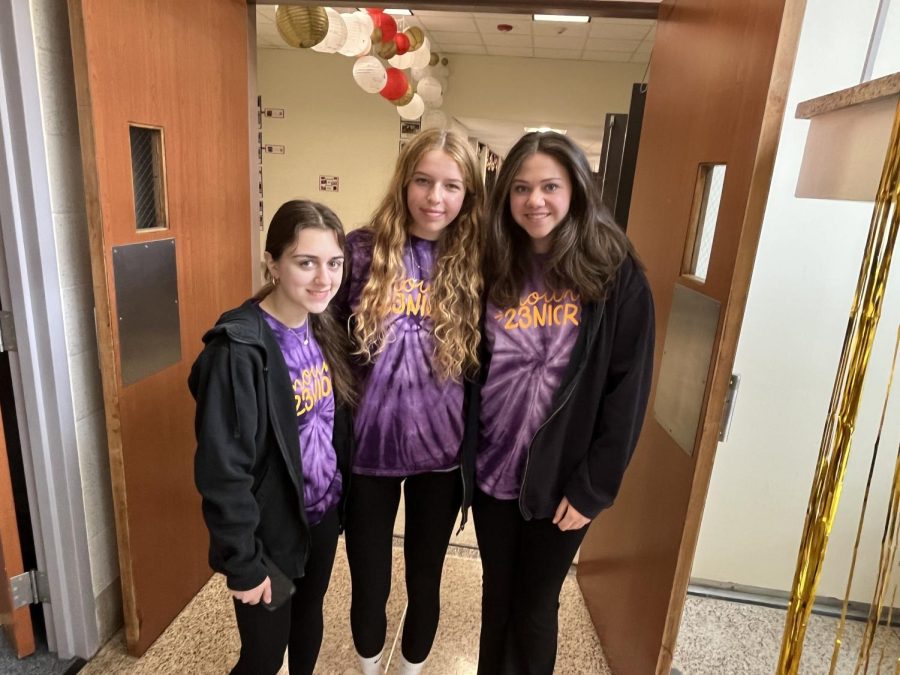 Leah Russo '23, Julia Tobin '23, and Emma McGrath '23 smile together after they celebrate their last Mount Charity Day.