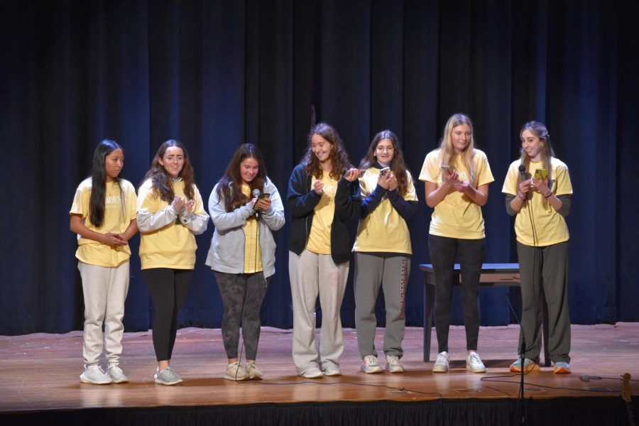 Junior student council representatives Aubrei Ranille '24, Kayla Funk '24, Quinn Shields '24, Laine Giovanniello '24, Kat Dougherty '24, Taylor Delli Carpini '24 and Audrey Kukla '24 share their gratitude for the teachers who contributed to Charity Day 2023.