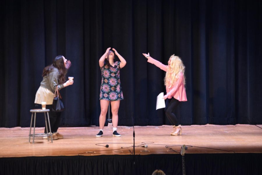 Mary Kate Andress '23, Julia Solecki '23 and Maddi Allen '23 parody a typical Mountie morning portraying a student running "late" to school. 