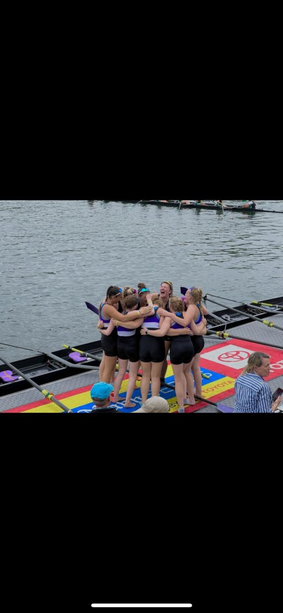 Mount crew boat celebrates after winning a race. 