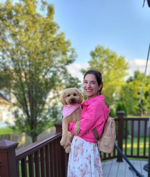 Señora Bornancini and her dog, Summer smile for a photo in their outfits for the premiere of the Barbie movie.