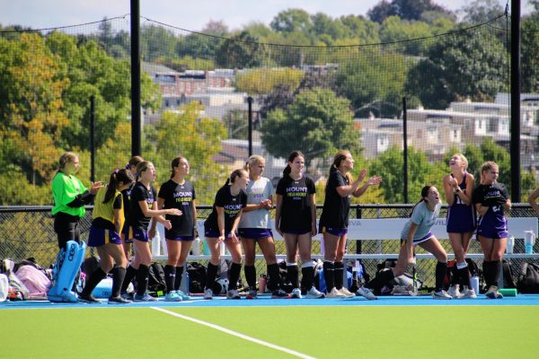 The Mount Junior Varsity Team cheers on the Varsity squad at the Max Field Hockey National Invitational. 