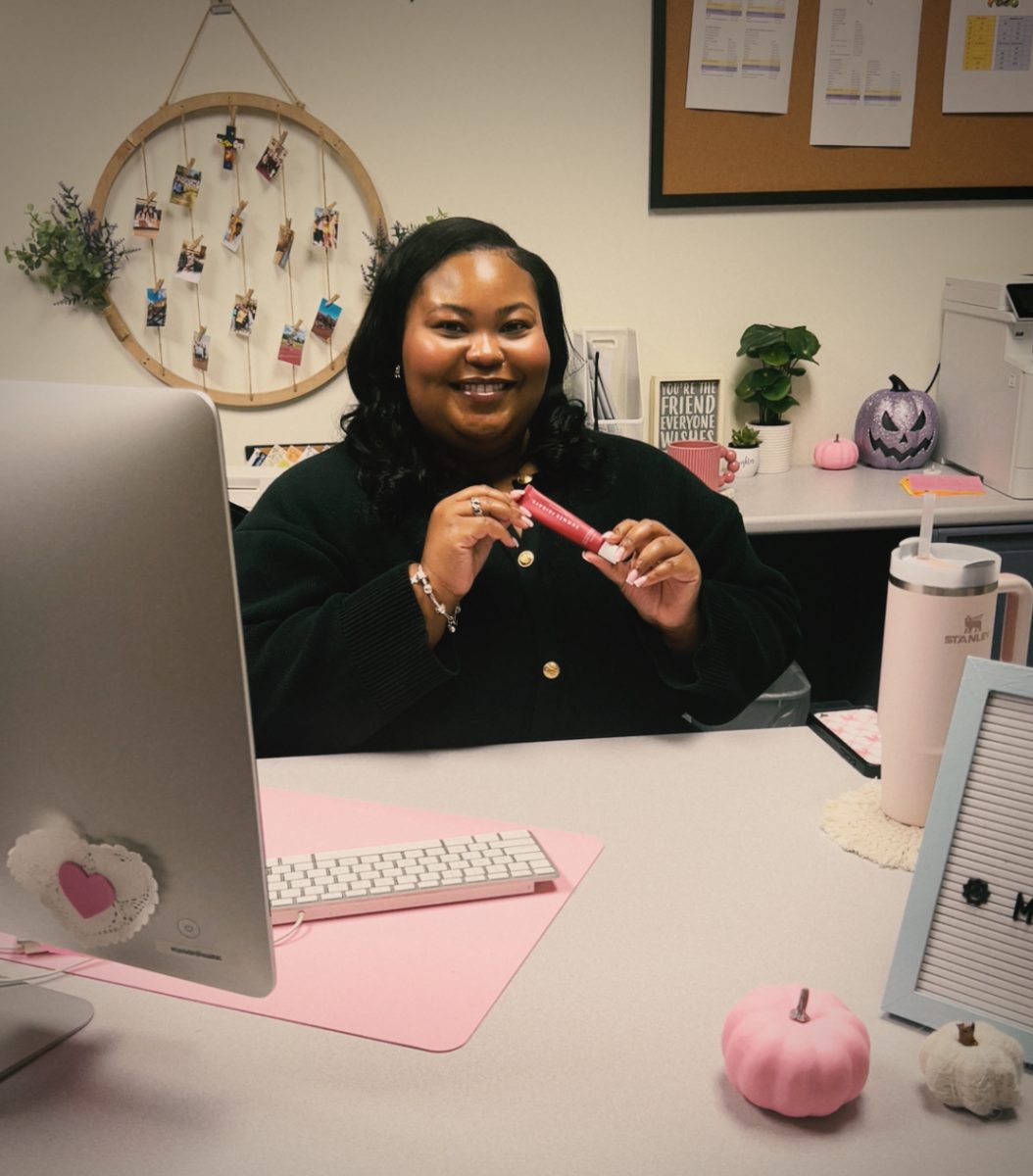 Mrs. Slaughter matches her lip gloss with her aesthetic pink office.