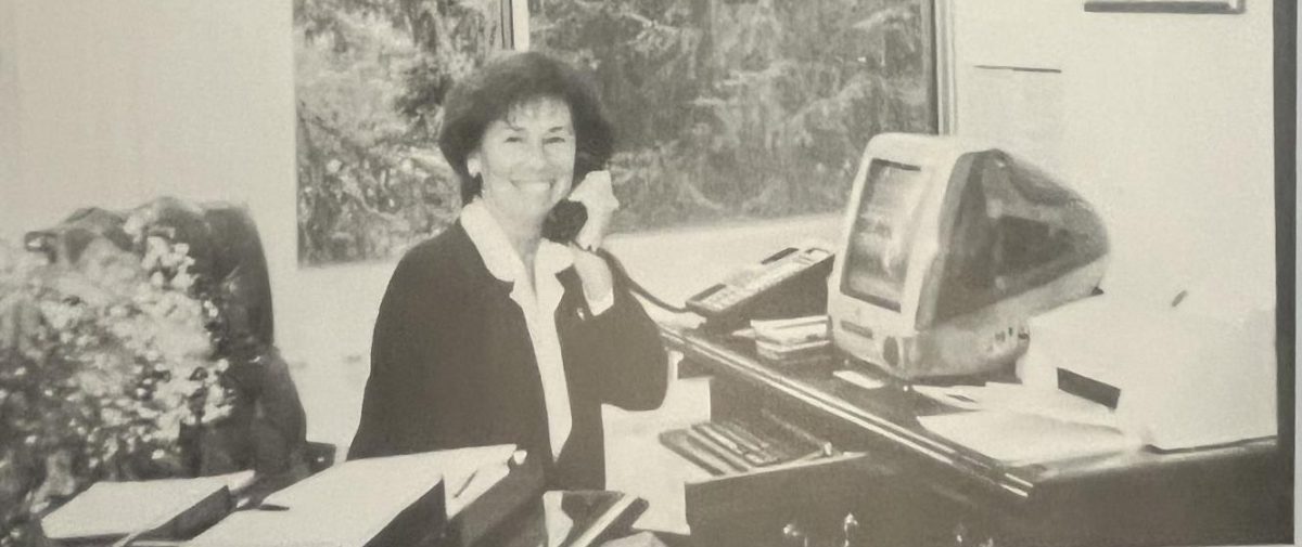 Sister Mary Dacey seen here smiling as she answers the phone. 