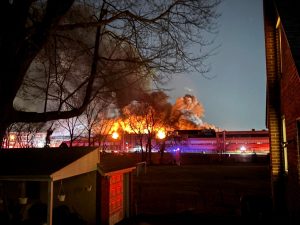 SPS building bursting into flames 