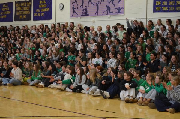 Student body gathers for an Eagles Pep Rally out of enthusiasm for Super Bowl Sunday