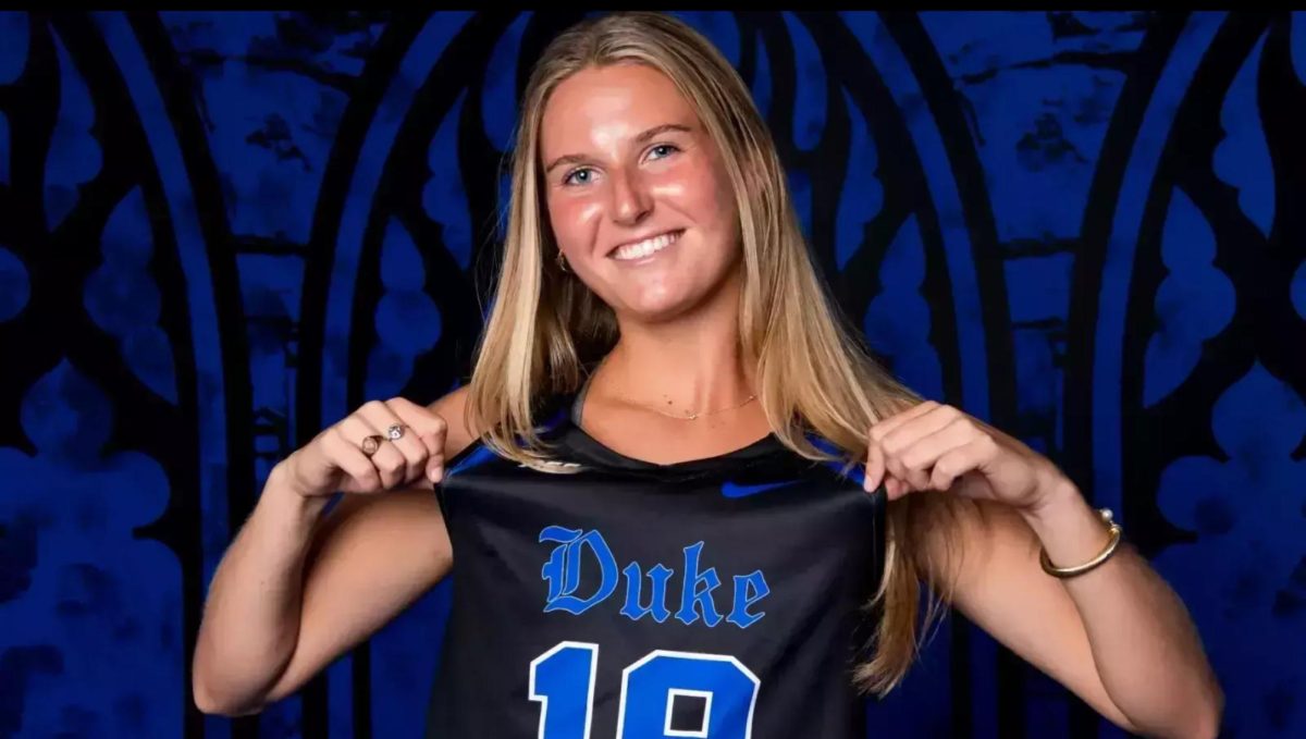 Megan Maransky ‘21 displays her Duke Jersey during field hockey’s media day. 