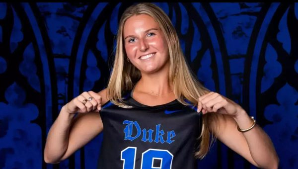 Megan Maransky ‘21 displays her Duke Jersey during field hockey’s media day. 