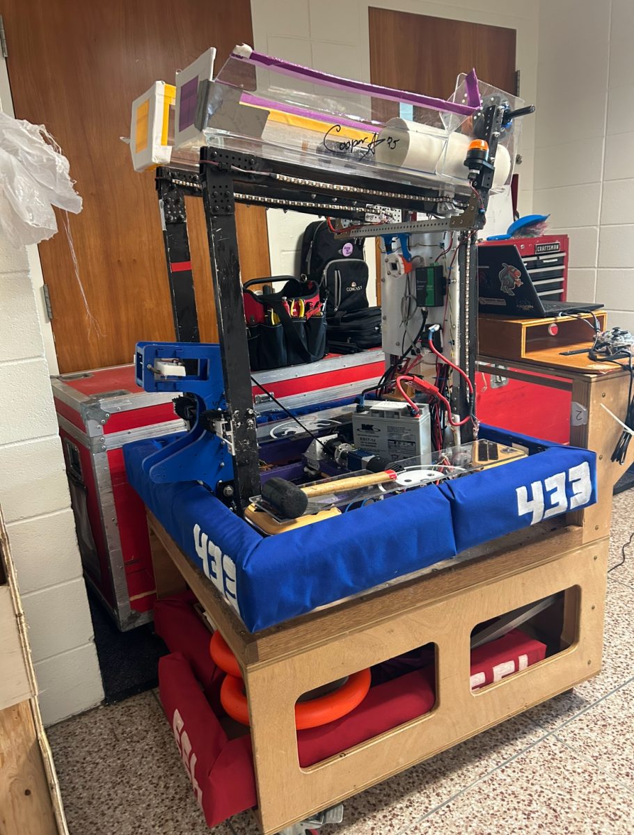 The Firebirds’ 2025-2026 year robot stands proudly in the wings, waiting to compete against many other teams and their robots. It had been designed and brought to life by the robotics students and teacher volunteers during the off season in the summer. The team sacrificed their sweet summer days to make their robot the perfect machine for competitions. This year, robotics teams aimed to create a robot that could carry and launch pvc pipes onto metal racks to win points. Speed, maneuverability, and accuracy are the name of the game in competition.

 “I’m the lead Robotics mentor at the Mount. GirlPOWER  is really important to me because I’ve seen over the years how much of a difference it makes in our community both here in our school and then also on other teams that we compete with. I’m really proud of all the hard work that goes into making GirlPOWER happen” Ms. Hannah Farrell '11 said. 