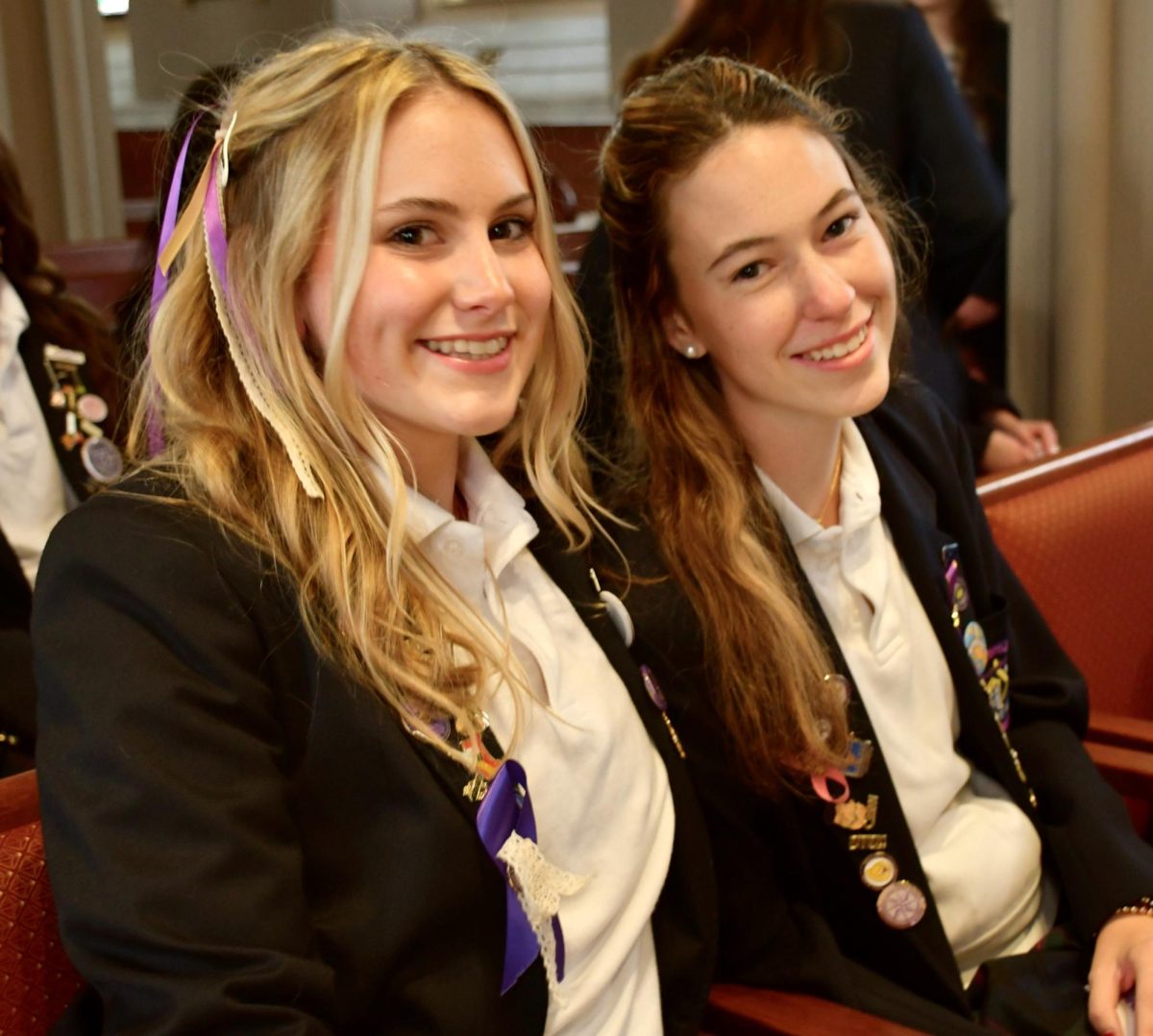 Phia Settelen ‘26 and Shannon Shields ‘26 sit together in the pews of the Chestnut Hill College Chapel. 

Settling into the pews and chairs in the chapel of Chestnut Hill, seniors take in the starry ceiling, marble sculptures, and unifying air of Founders’ Day for their final time.

 “It’s a very bittersweet feeling,” Phia Settelen ‘26 said. “Founders’ Day is such an important day to me.”
