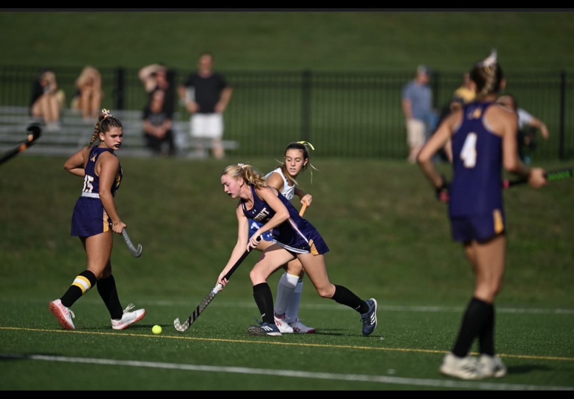 Julia McGlynn swiftly moves passed opponent and gets fast break to move down the field. 