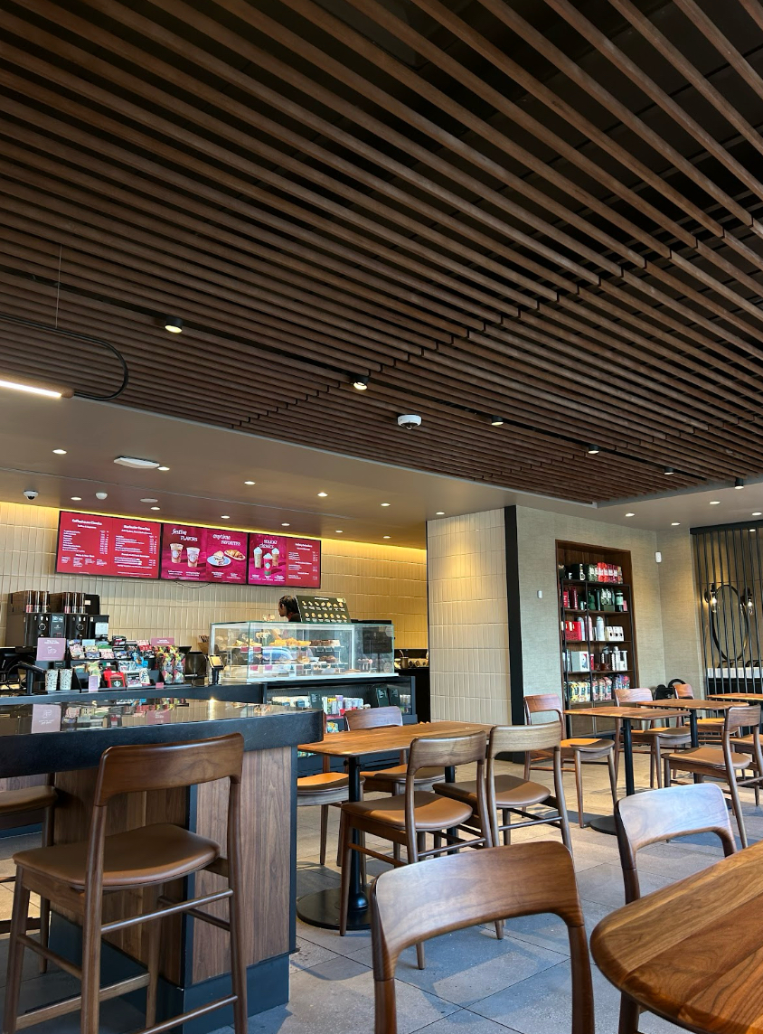 Starbucks showing their holiday menu on the screens