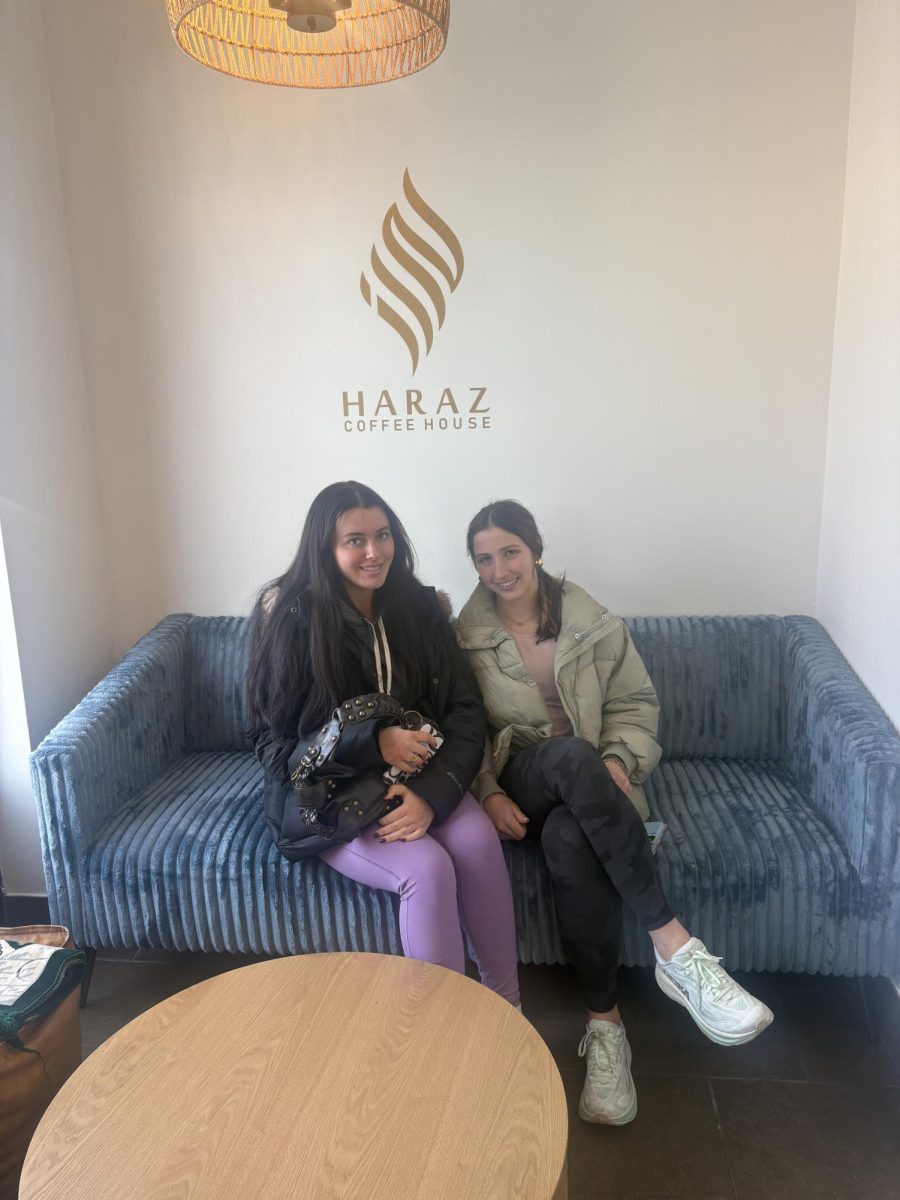 Lilly McGann ‘27 and Elyse McGlynn ‘27 sit at Haraz Coffee House, Flourtown.