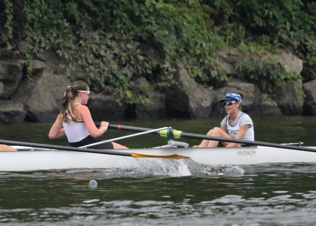 Harris rowing for her summer team CRC at the Independence Day Regatta