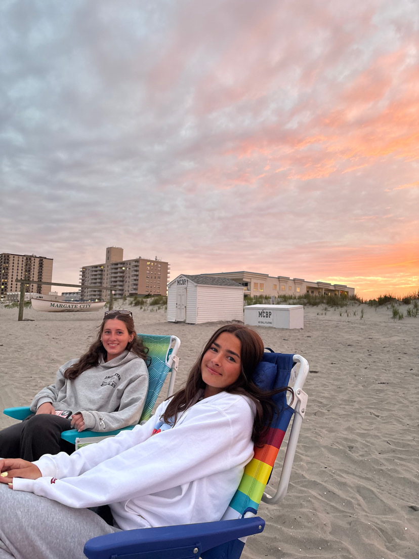Caroline Squillaro ‘27 sitting on the beach while watching the sunset in Margate, New Jersey. 