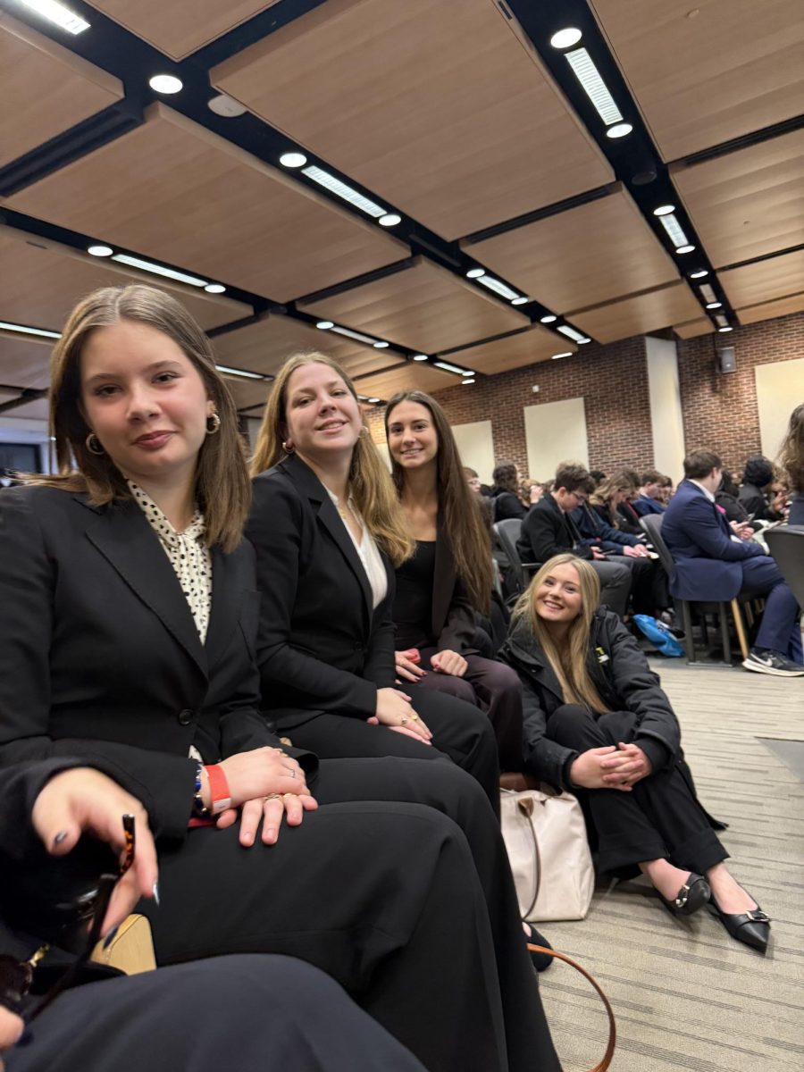 Marlee Larson, Maeve Ruibal, Erin Rietzke, Erin Sondesky pause to smile at the University of Pennsylvania  Ben Franklin Invitational.