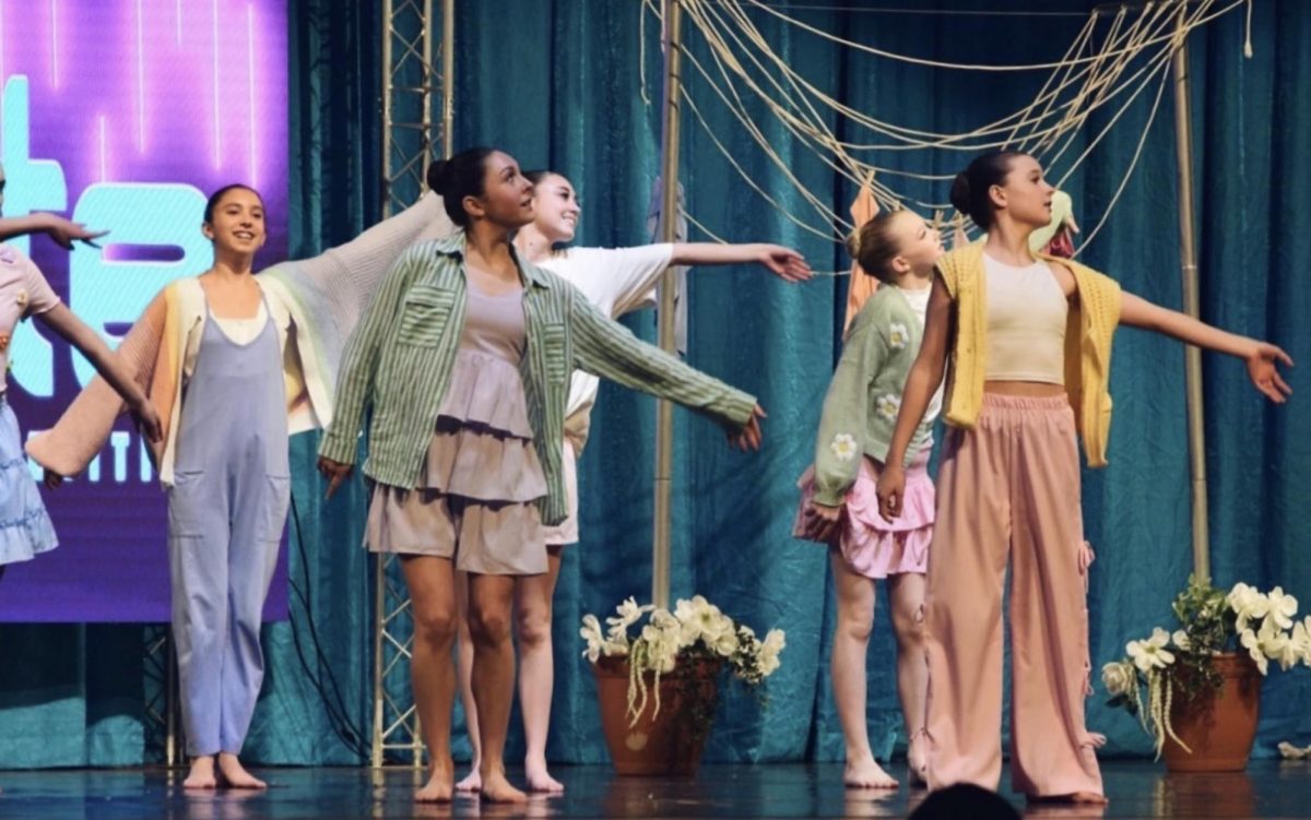 Audrey performing on stage